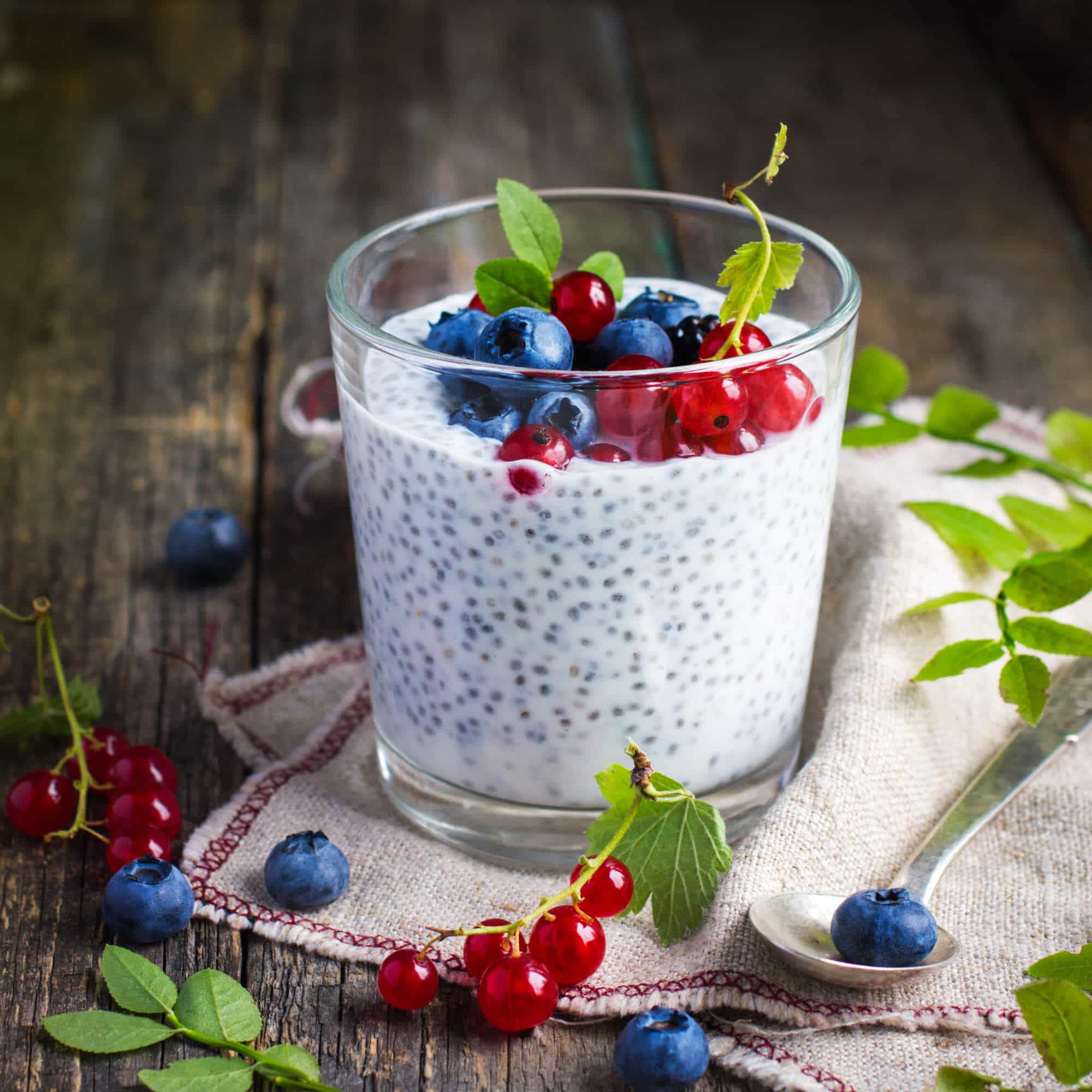 Natural yogurt with chia seeds and fresh berries, concept of healhty food, square image